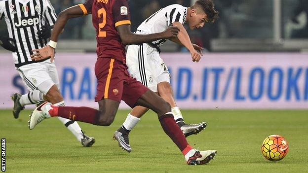 Paulo Dybala scores the winning goal for Juventus against Roma