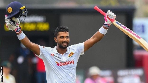 Sri Lanka batter Dinesh Chandimal celebrates reaching his double century against Australia