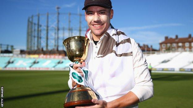 Surrey captain Rory Burns with the County Championship trophy