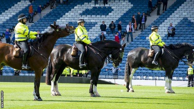 Police respond to disorder at the Scottish Cup final