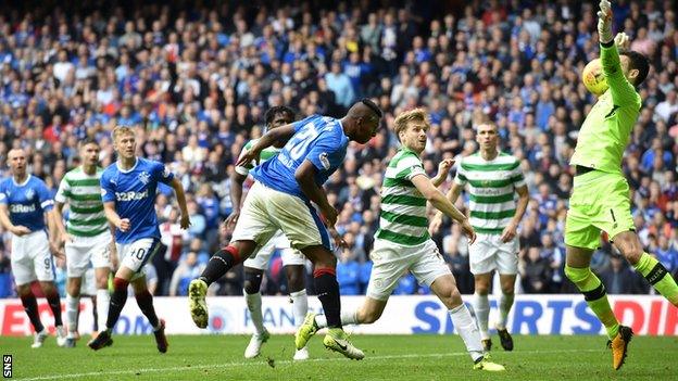 Rangers' striker Alfredo Morelos (left) sees his header saved by Craig Gordon