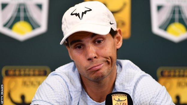 Rafael Nadal shrugs