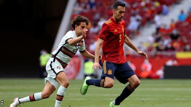 Spain midfielder Sergio Busquets playing against Portugal