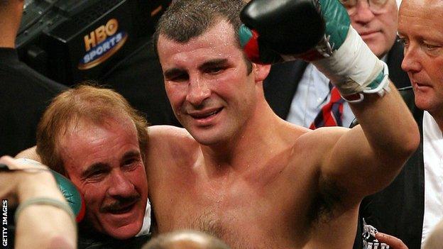 Enzo Calzaghe celebrates with son Joe after he beat Bernard Hopkins in Las Vegas in 2008