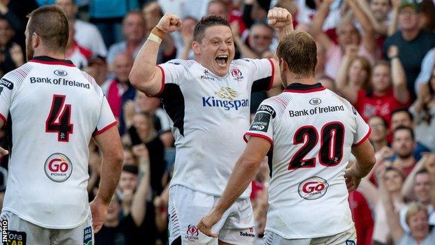 Ulster replacement prop Ross Kane celebrates with team-mates after the final whistle