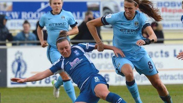 Birmingham City's Remi Allen wins the ball ahead of Manchester City's Jill Scott