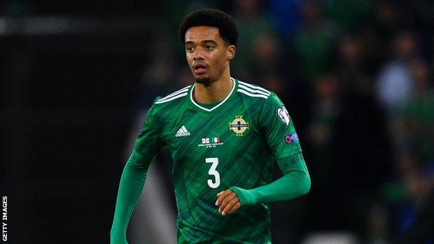 Lewis in action for Northern Ireland