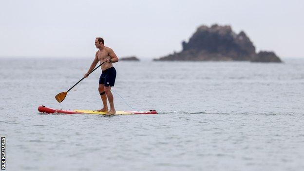 Alun Wyn Jones paddle boarding