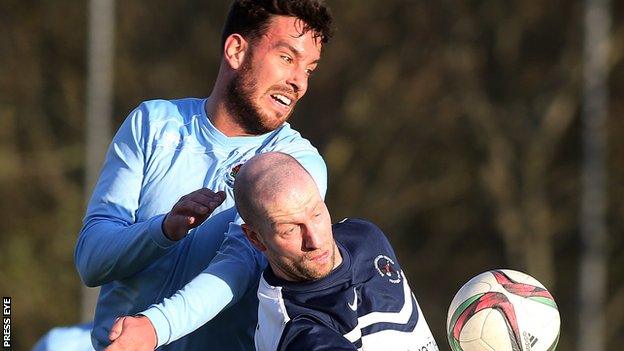 Ballinamallard's Stephen O'Flynn and Institute's Mark Scoltock played in the first leg promotion play-off, which Ballinamallard won 2-1