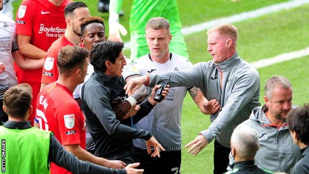 Alan Tate played for Swansea in all four divisions and was working in the club's academy before joining the first-team coaching staff