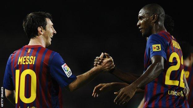 Lionel Messi and Eric Abidal