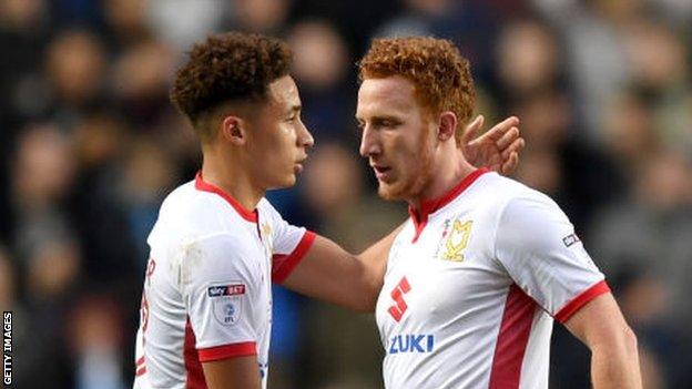 marcus tavernier and dean lewington of mk dons