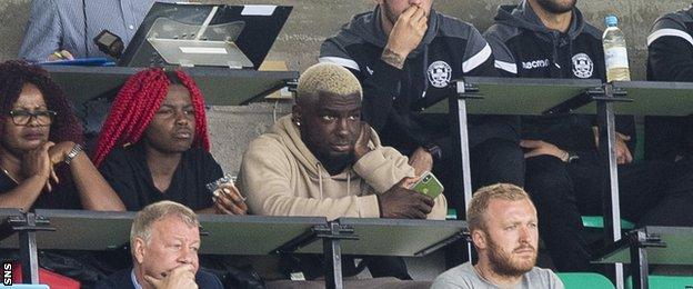 Former Motherwell defender Cedric Kipre watches from the Easter Road press box