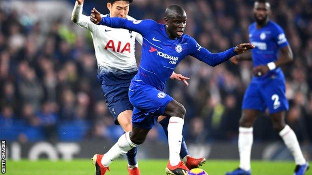 N'Golo Kante runs with the ball