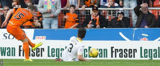 Cammy Smith lashes home his second goal for Dundee United