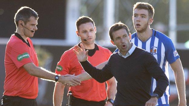 Dundee manager Neil McCann remonstrates with referee Steven McLean