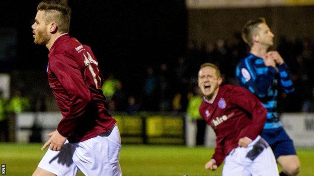 Linlithgow's Kevin Kelbie (left) celebrates his winning goal