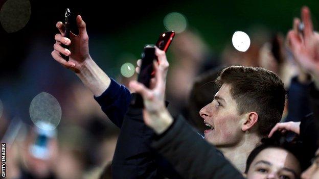 Supporters at Norwich v Derby during floodlight failure