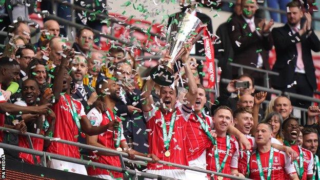 Rotherham captain Richard Wood lifts the Papa John's Trophy