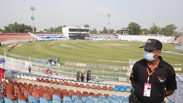 Security official at cricket ground