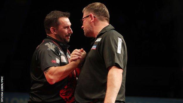 Jonny Clayton's accurate finishing was too much for James Wade in Wollongong