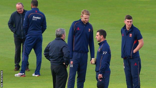 Essex players in the middle with umpires at Headingley