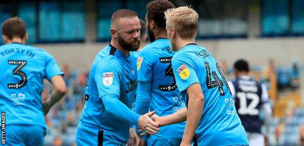 Wayne Rooney (left) congratulates Louie Sibley