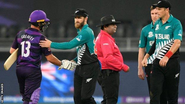 Scotland's Chris Greaves shakes hands with New Zealand captain Kane Williamson