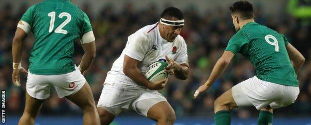 Mako Vunipola carries the ball for England