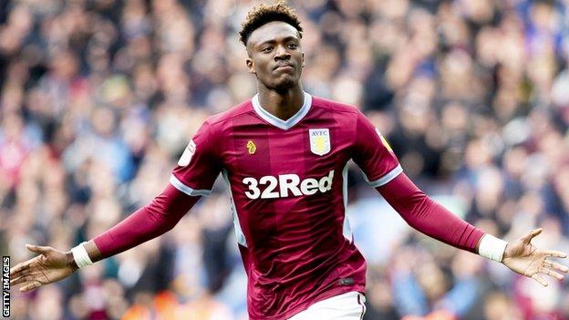 Tammy Abraham celebrates scoring a goal for Aston Villa