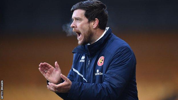 Darrell Clarke celebrates a goal for Walsall