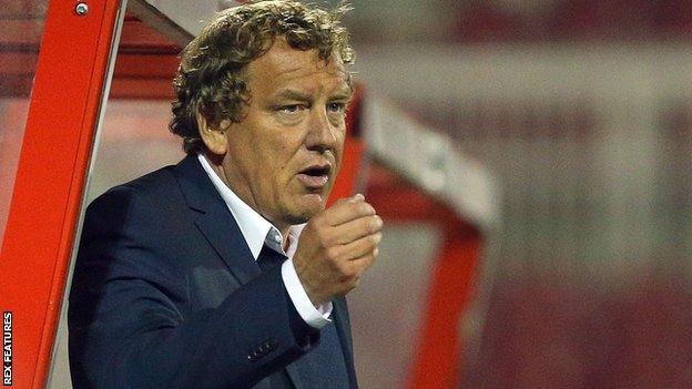 Lee Power in the dugout at Swindon