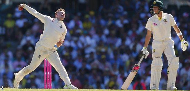 Steve Smith watches fellow leg-spinner Mason Crane's action closely