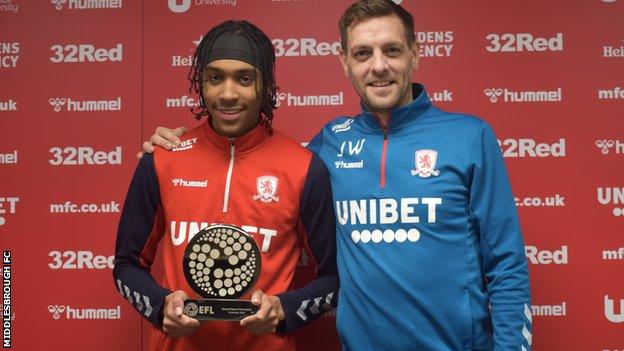 Middlesbrough defender Djed Spence with the award and head coach Jonathan Woodgate