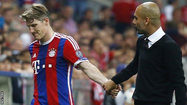 Bayern Munich midfielder Bastian Schweinsteiger (left) and manager Pep Guardiola