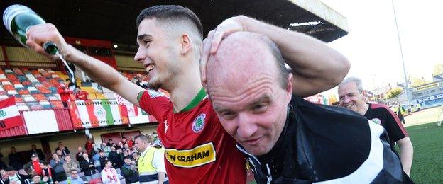 Cliftonville player Jay Donnelly and manager Barry Gray