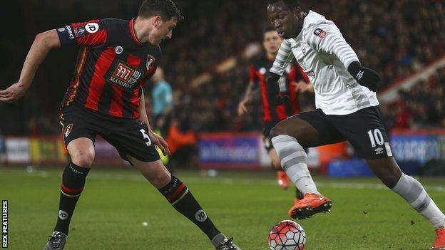 Tommy Elphick challenges Everton's Romelu Lukaku