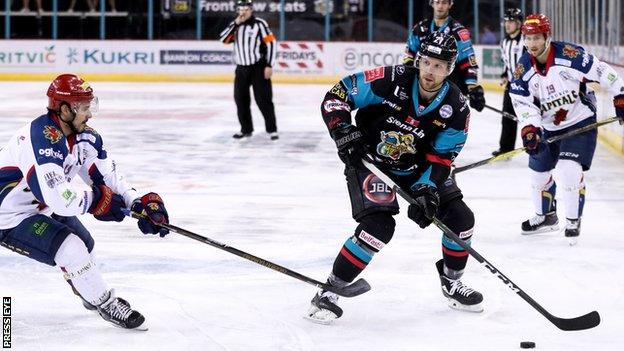 Edinburgh's Mike Cazzola closes in on John Kurtz during the Elite League game against the Giants