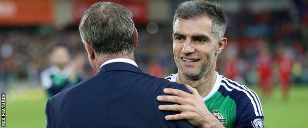 Northern Ireland manager Michael O'Neill and Aaron Hughes celebrate beating Czech Republic