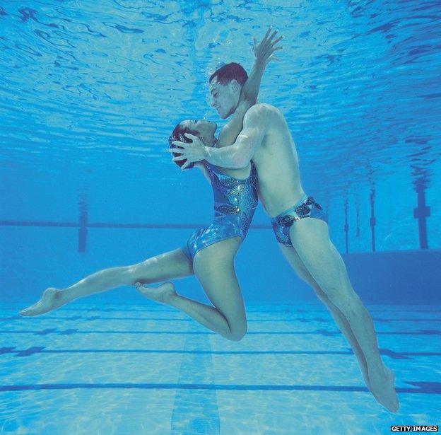 Bill May and Kristina Lum in the water in 1998