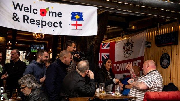 England fans have been the focus of fond attention in Pristina, including from the media