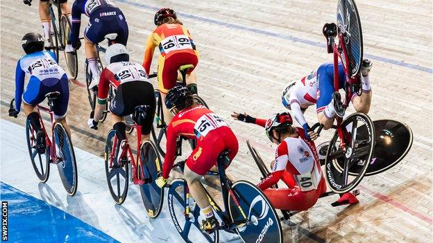 Britain's Laura Kenny (far right) crashes during the tempo race in the women's omnium at the Track World Cup in Milton, Canada