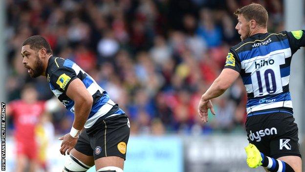 Taulupe Faletau and Rhys Priestland in action for Bath against Scarlets