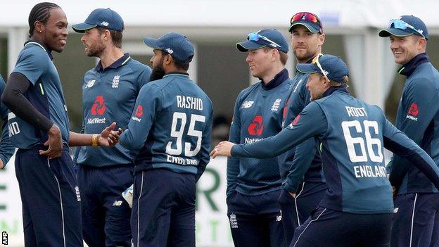 Jofra Archer celebrates his first international wicket with team-mates