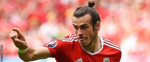 Gareth Bale celebrates after scoring against Slovakia