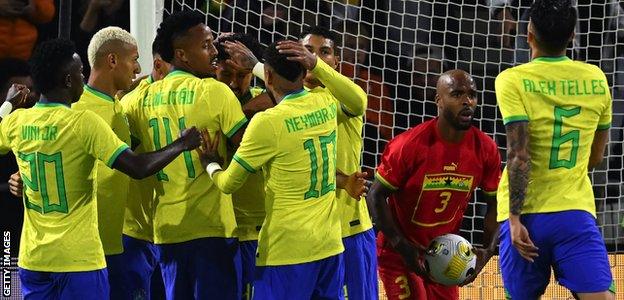 Ghana goalkeeper Denis Odoi in action against Brazil