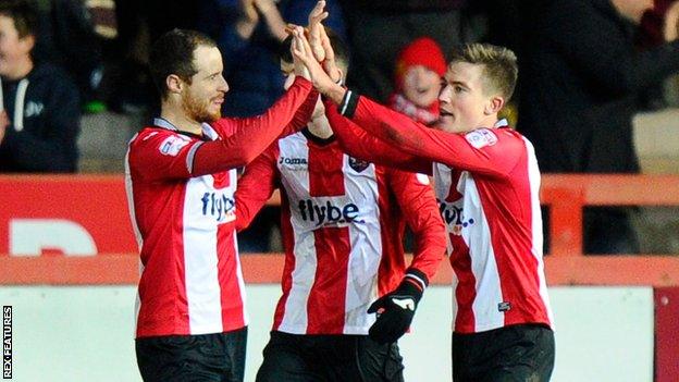 Exeter celebrate David Wheeler's goal