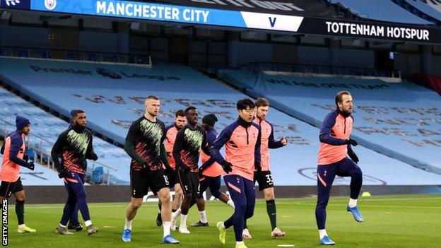 Harry Kane warming up at the Etihad Stadium