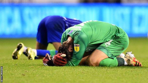 Wigan players dejected