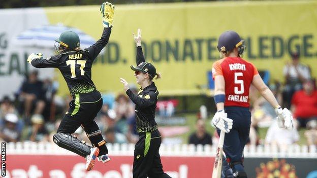 Alyssa Healy celebrates after stumping Heather Knight